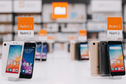 An enticing scene of a modern online store showcasing various Xiaomi Redmi 2 smartphones with attractive price tags, highlighting the vibrant ambiance of a digital marketplace in Brazil. No texts on scene. Keywords: photorealistic style, high resolution, 4k details, HDR, cinematic lighting, professional photography, studio lighting, vibrant colors.