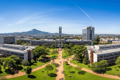 A panoramic view of the campuses of USP, Unesp, and Unicamp, showcasing their iconic buildings and lush greenery under a clear blue sky, with students walking and engaging in activities, captured in photorealistic detail, 4K, HDR, cinematic lighting, ultra detailed, award-winning photography, studio shot, vibrant colors.